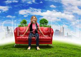 Young woman sitting on sofa nature background
