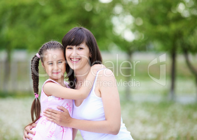 Young mother and her young daughter