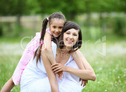Young mother and her young daughter