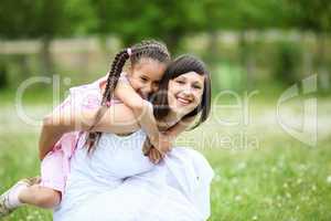 Young mother and her young daughter