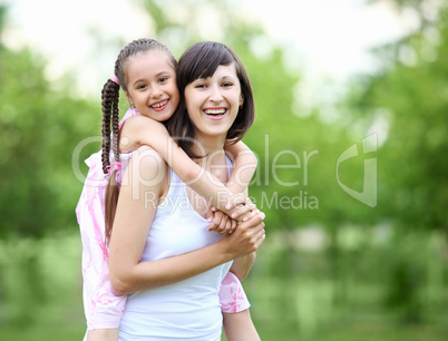 Young mother and her young daughter