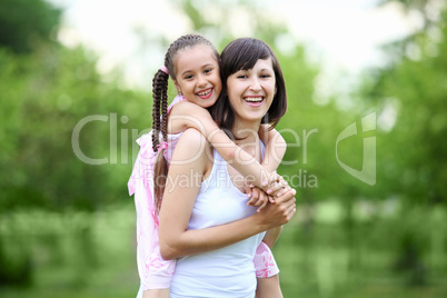 Young mother and her young daughter