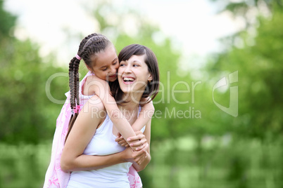 Young mother and her young daughter