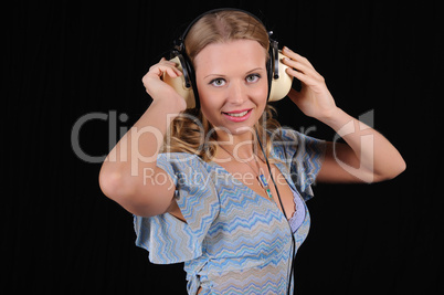 young girl with headphones