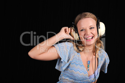 young girl with headphones