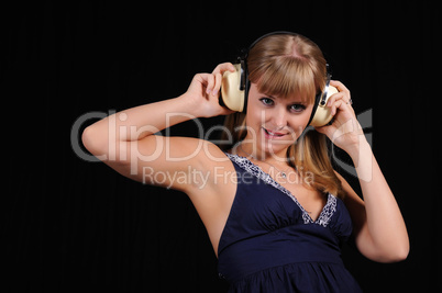 young girl with headphones