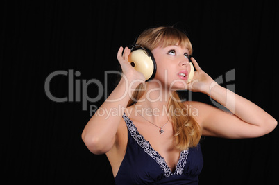 young girl with headphones