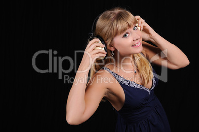 young girl with headphones