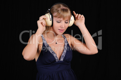 young girl with headphones