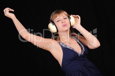 young girl with headphones