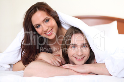 portrait of  young couple in bed