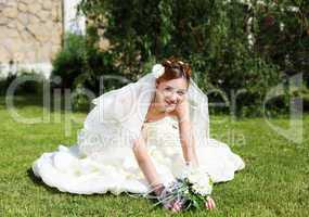 Portrait of a young bride in a white dress