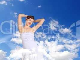 Woman against blue sky background