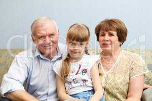 grandparents and granddaughter