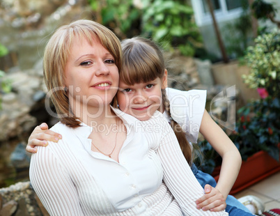 young mother with her little daughter