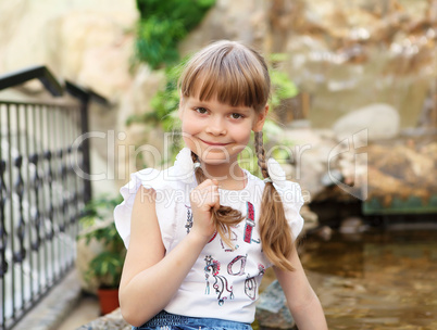 portrait of little girl outdoors