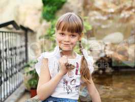 portrait of little girl outdoors