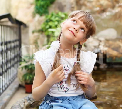 portrait of little girl outdoors