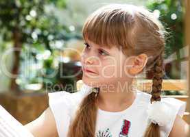 portrait of little girl outdoors