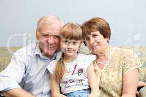 grandparents and granddaughter