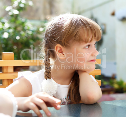 portrait of little girl outdoors