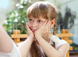 portrait of little girl outdoors