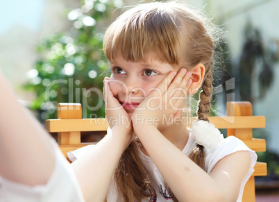 portrait of little girl outdoors