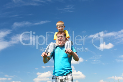 father with son in summer day outdoors