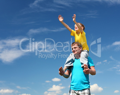 father with son in summer day outdoors