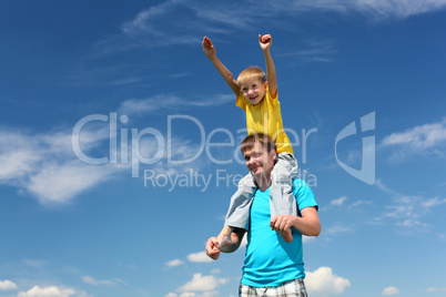 father with son in summer day outdoors