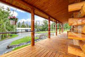 Long cabin horse farm house porch.