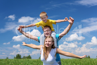 family with children in summer day outdoors