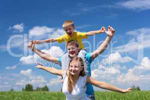 family with children in summer day outdoors