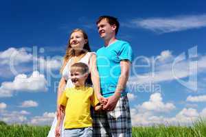 family with children in summer day outdoors