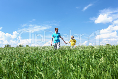 father with son in summer day outdoors