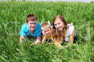 family with son on the meadow