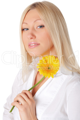 Young smiling blonde in a white shirt