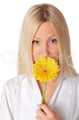 Young smiling blonde in a white shirt