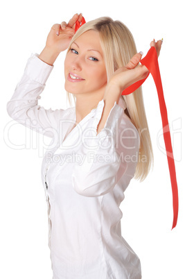 Young smiling blonde in a white shirt