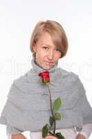 a young pretty woman with a red rose