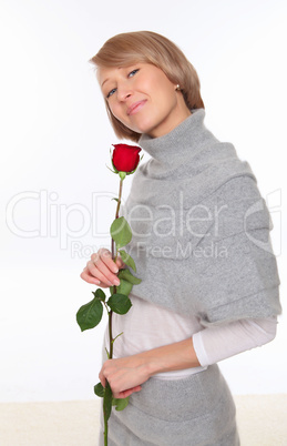 a young pretty woman with a red rose a young pretty woman with a red rose