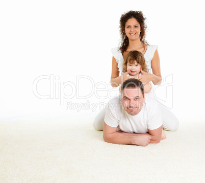 mother, father and their child together in studio mother, father and their child together in studio