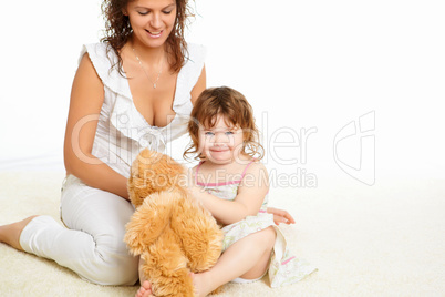 young mother having fun with her little son