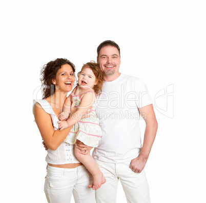 mother, father and their child together in studio