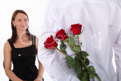 man with red roses