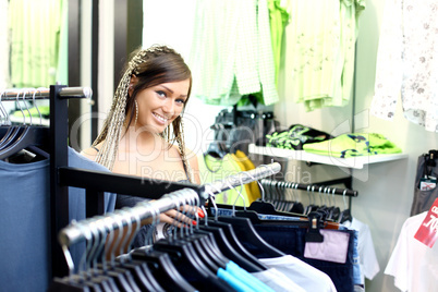 Young girl buying clothes