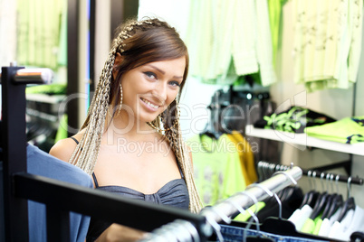 Young girl buying clothes