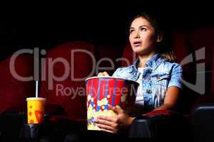 Young girl in cinema