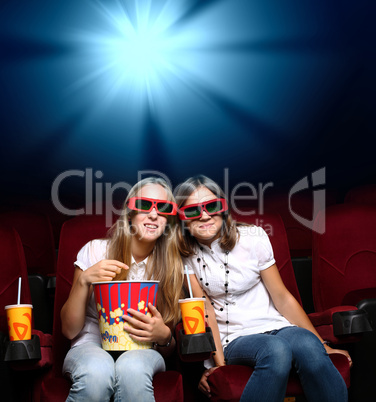 Two young girls in cinema