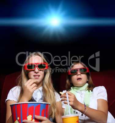 Two young girls in cinema